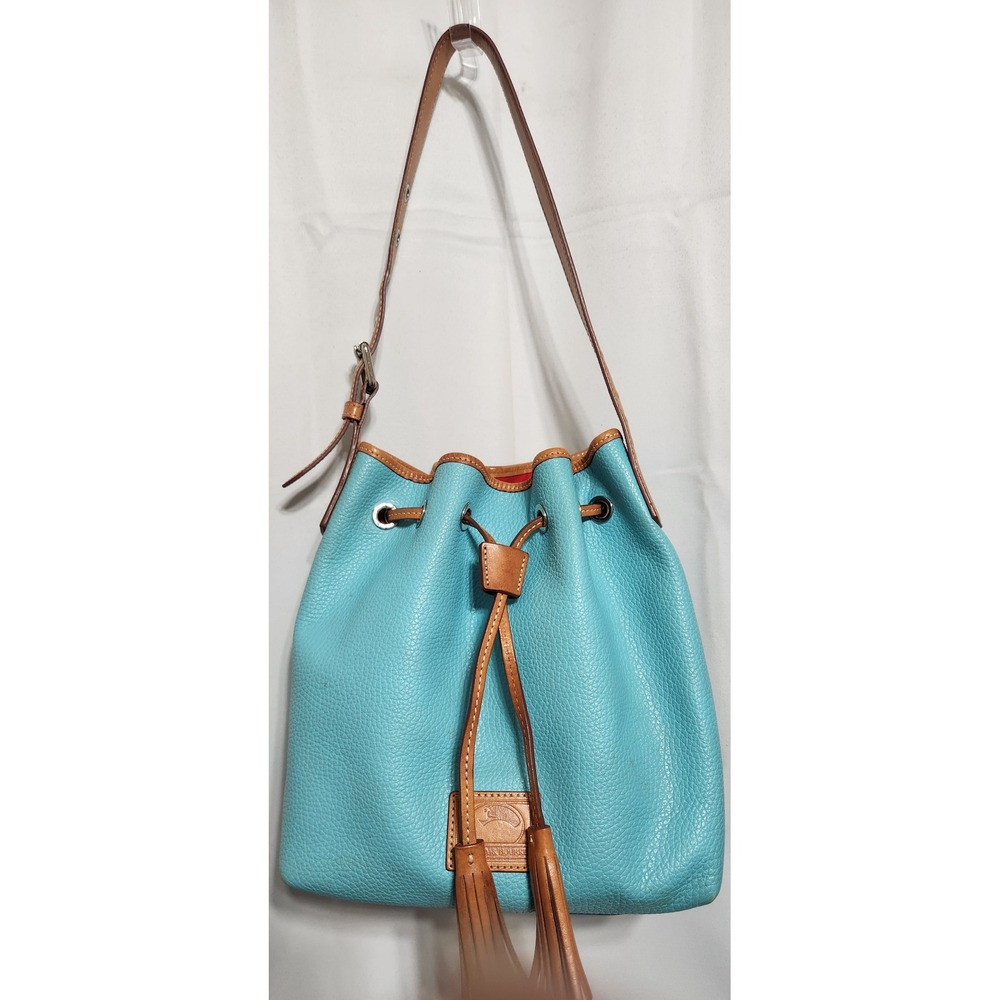 Dooney‎ & Bourke Turquoise Pebbled Leather Drawstring Bucket Bag Tassel Tan Trim